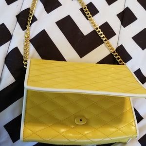 Saks 5th Avenue yellow purse with gold chain